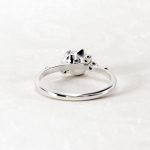 Pear Cut Solitaire with Accents Moissanite Ring - Image 5