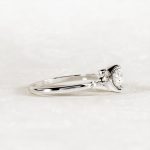 Pear Cut Solitaire with Accents Moissanite Ring - Image 4
